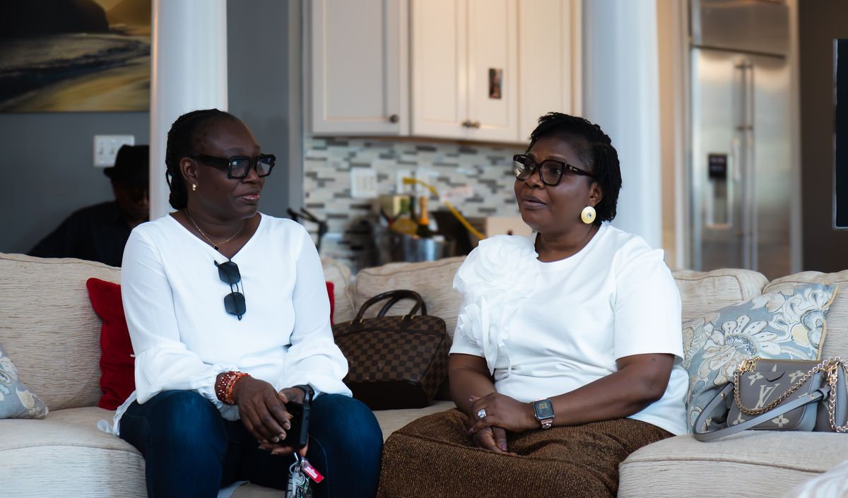 Two women in conversation at The MEND Experience