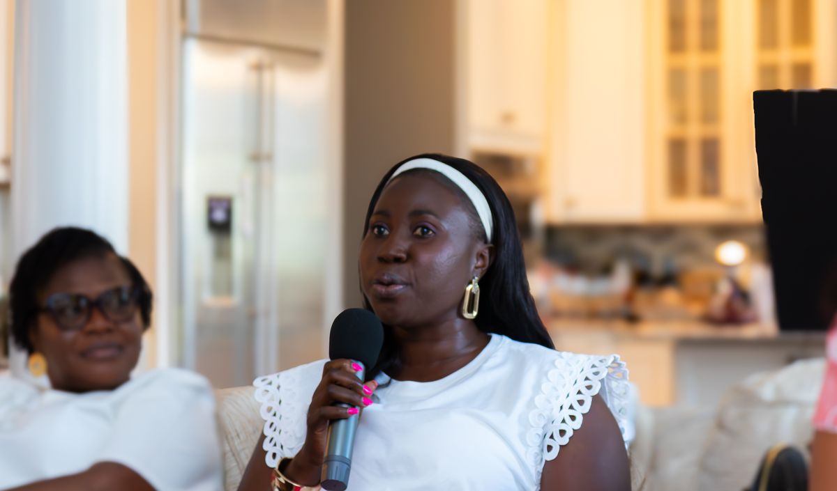A woman sharing her story with the group at The MEND Experience
